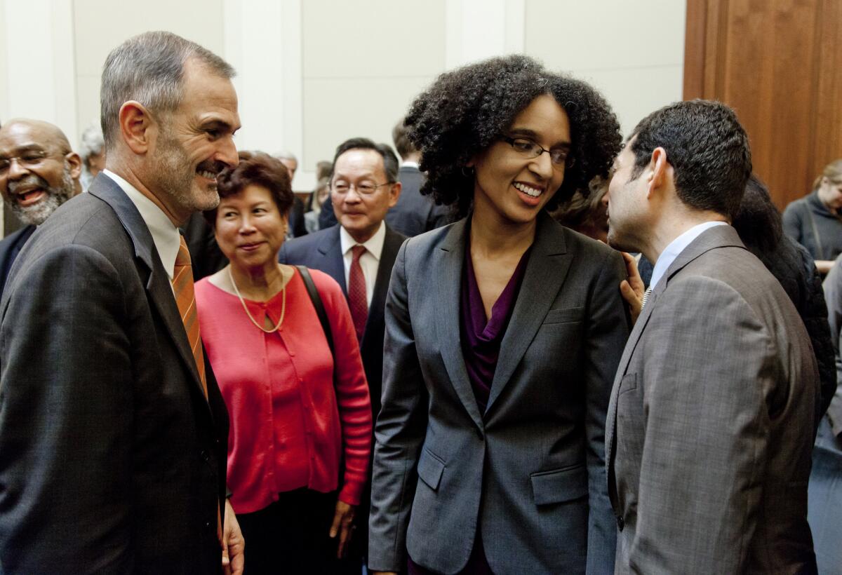 California Supreme Court Justices Leondra Kruger, center, and Mariano-Florentino Cuellar, right, provided the necessary votes to rehear a death penalty case.