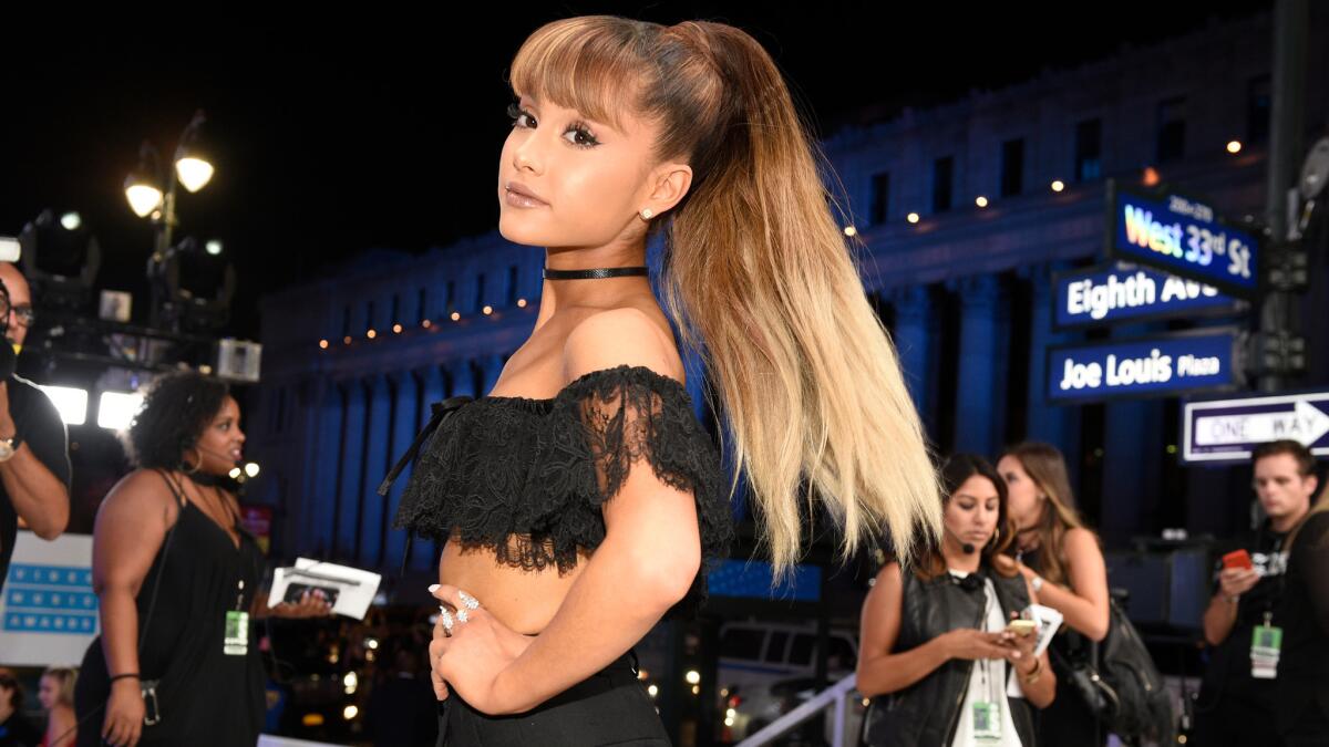 Singer Ariana Grande arriving at the MTV Video Music Awards at Madison Square Garden on Aug. 28, 2016. Based on research by big-date firm Edited, her bared-shoulder look would be a winner on the runway this season.