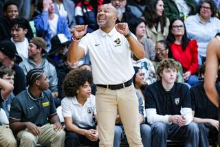 Crespi basketball coach Derek Fisher trying to make a teachable moment.