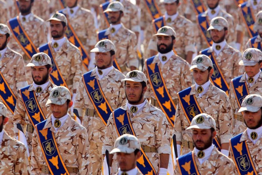 Mandatory Credit: Photo by ABEDIN TAHERKENAREH/EPA-EFE/REX (10191008a) (FILE) - Iranian revolutionary guard soldiers march during the annual military parade marking the Iraqi invasion in 1980, which led to an eight-year-long war (1980-1988) in Tehran, Iran, 22 September 2013 (reissued 08 April 2019). The US government on 08 April 2019 said it had designated Iran's revolutionary guards corps (IRGC) as a terrorist organization, marking the first time a US government has made such a designation on a foreign government's organization. US designates Iran's Revolutionary Guards a terrorist organization, Tehran, Iran (Islamic Republic Of) - 22 Sep 2013 ** Usable by LA, CT and MoD ONLY **