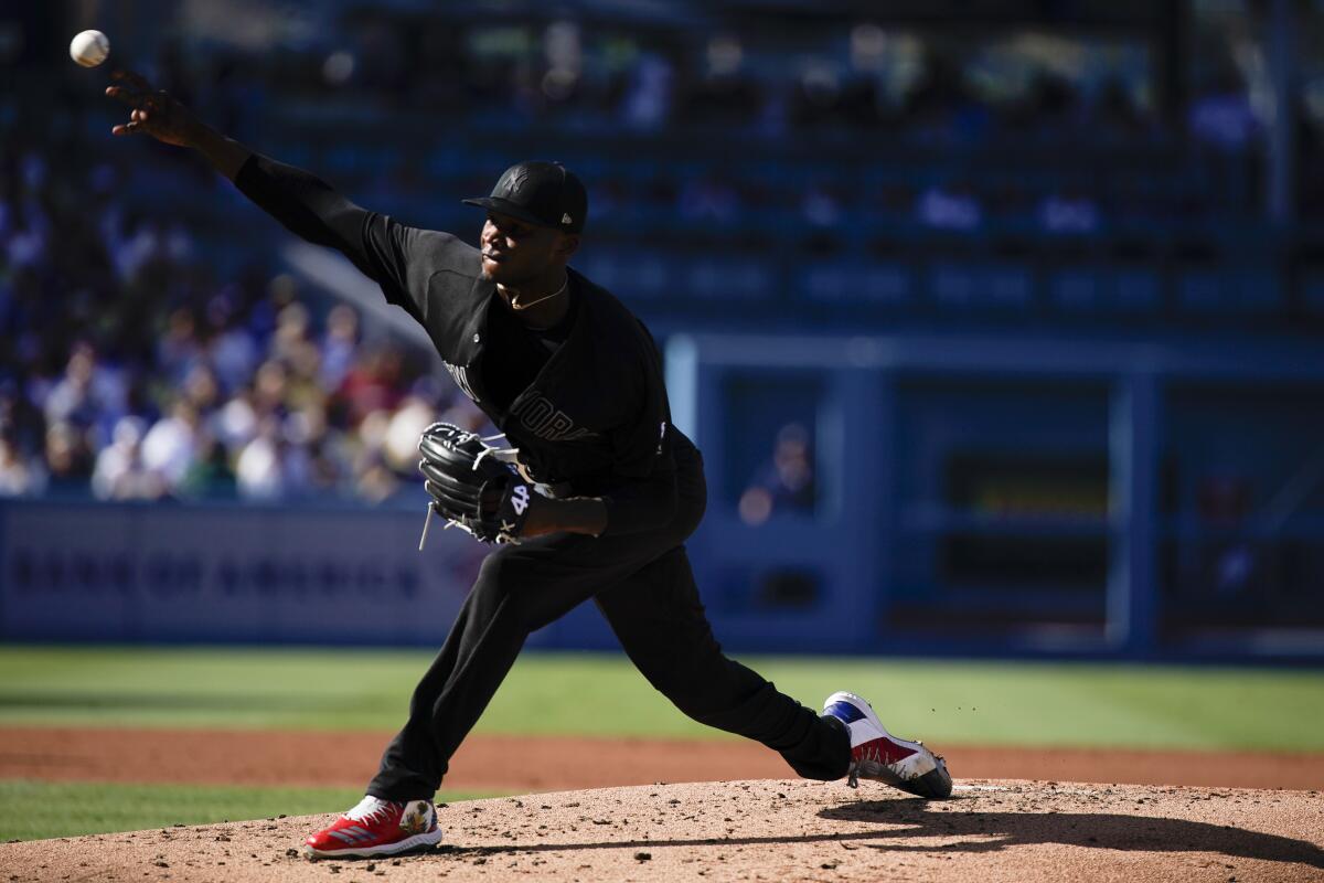 Yankees starting pitcher Domingo German delivers during Sunday's win over the Dodgers.