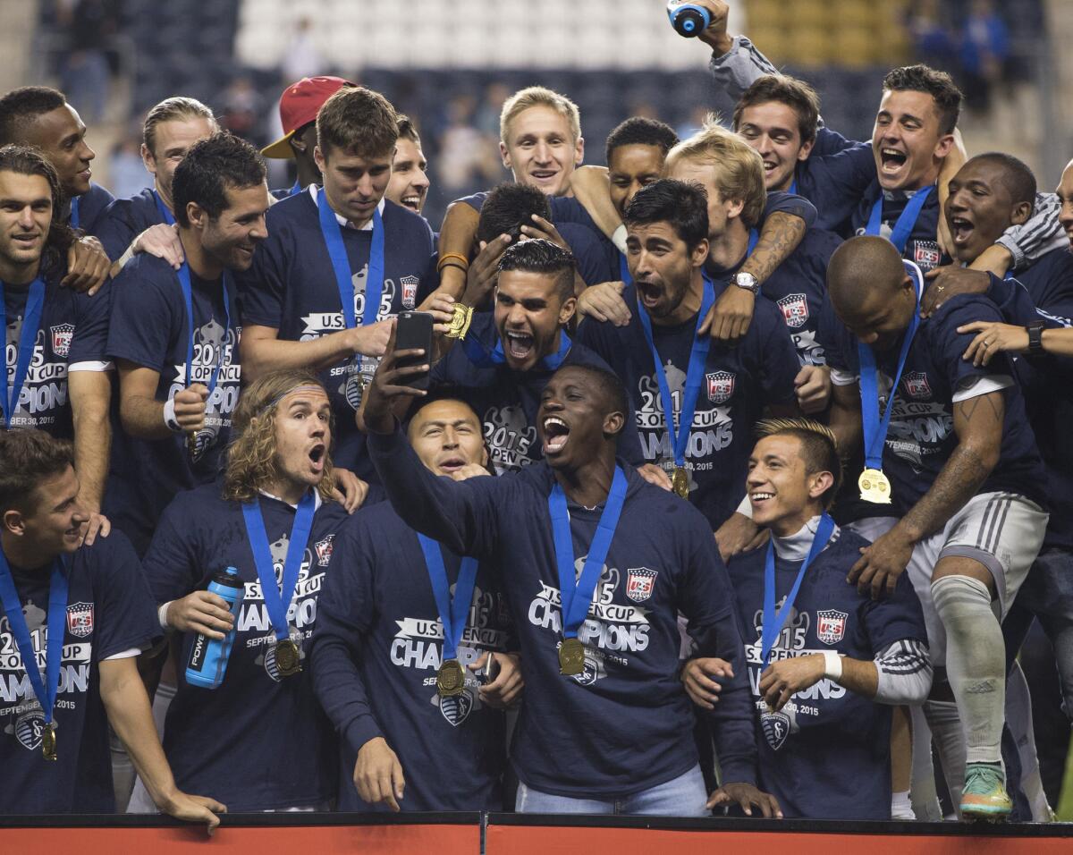 Sporting Kansas City takes a team photo after defeating the Philadelphia Union in the U.S. Open Cup Final.