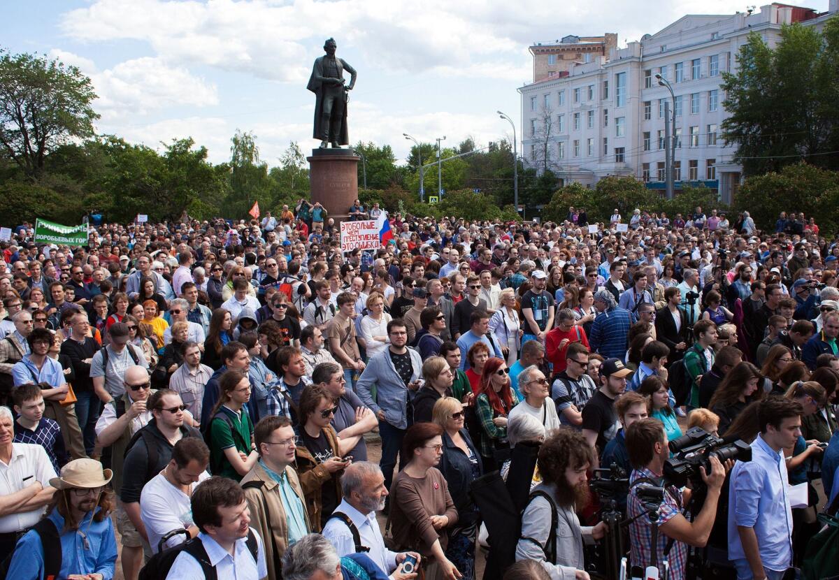 Hundreds of Russians, many of them scientists, take part in an anti-government demonstration June 6, expressing fear that after the Kremlin crackdown on media, rights activists and political opponents that it is now targeting independent scientific and technology development.