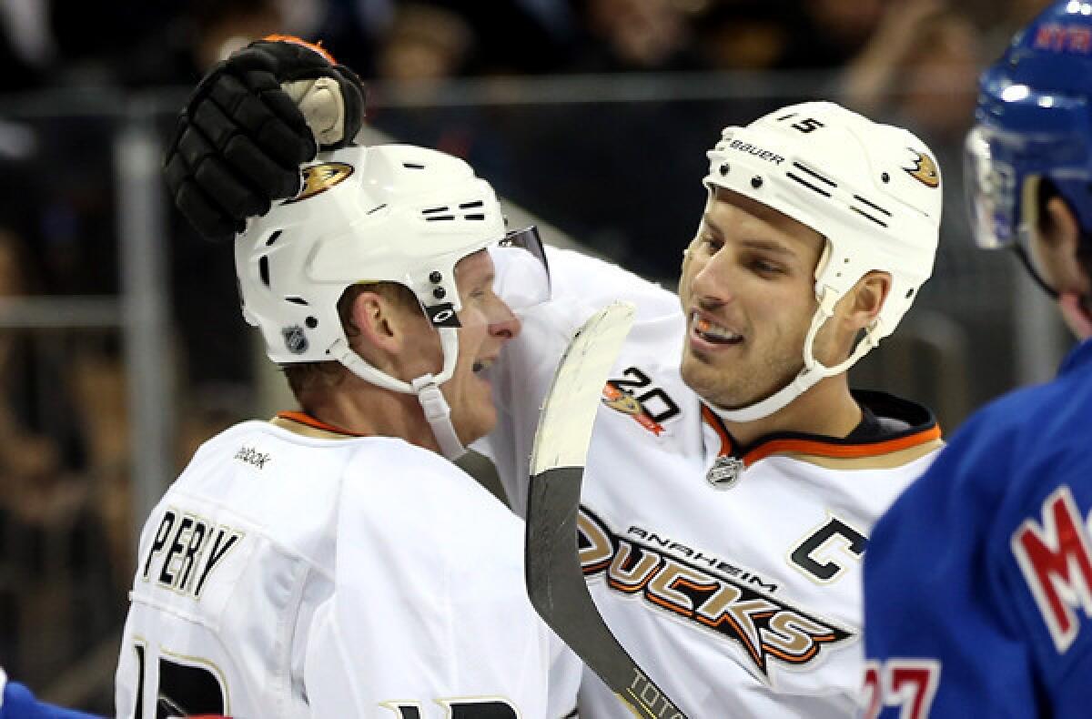 Ducks winger Corey Perry celebrates with captain Ryan Getzlaf after scoring a goal against the Rangers during a game earlier this season in New York.