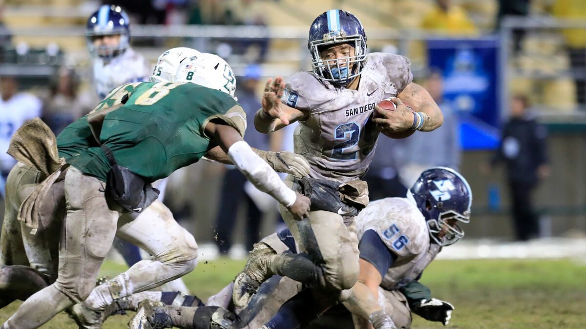 USD senior running back Jonah Hodges carried 35 times for 171 yards and three touchdowns.