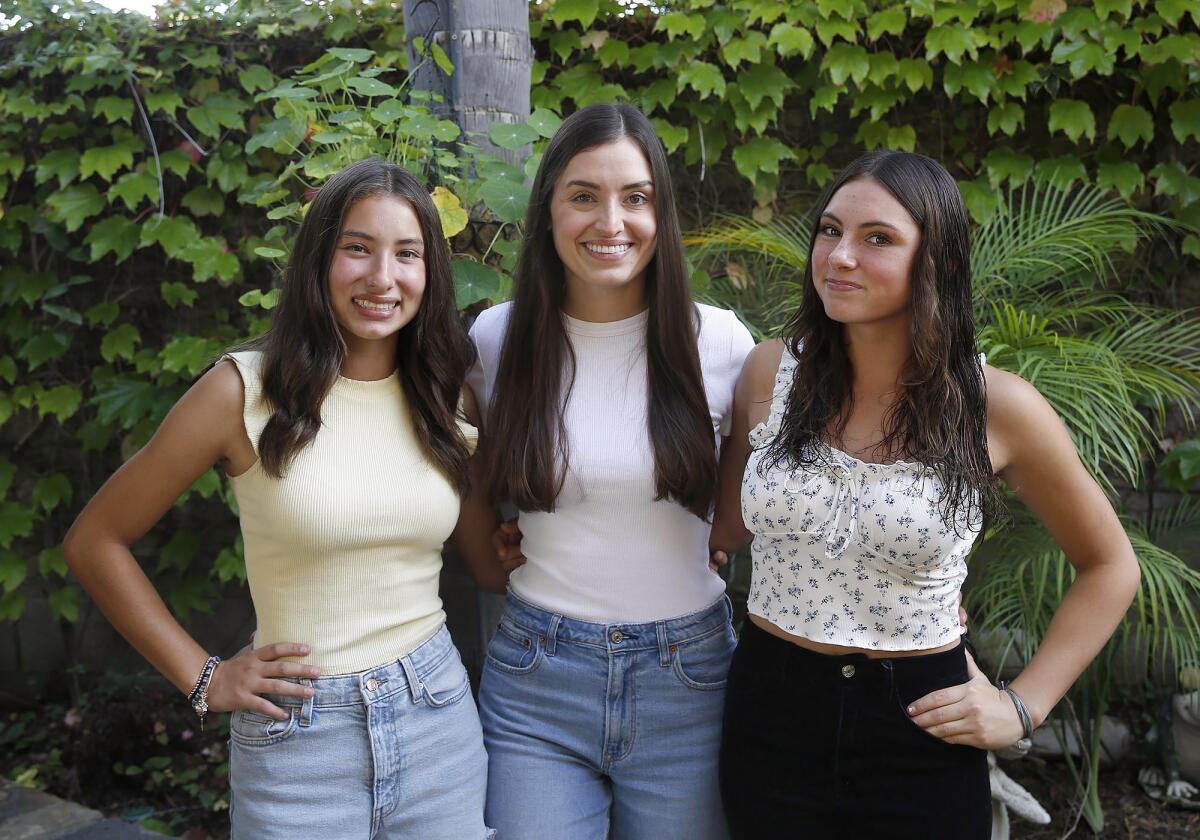 Alexis, Cassie and Jessie Ross, from left, at their home in Huntington Beach on Thursday.