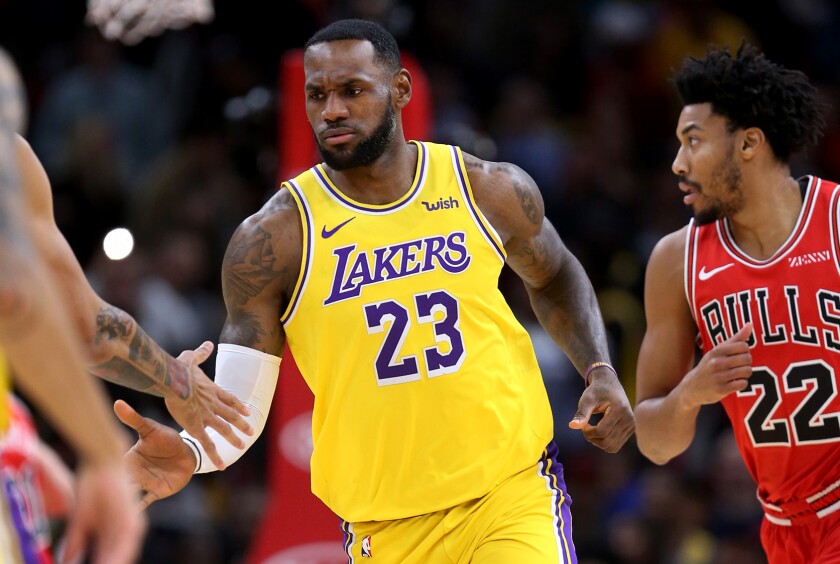 Lebron James Hits Lakers Milestone Last Achieved By Magic Johnson Los Angeles Times