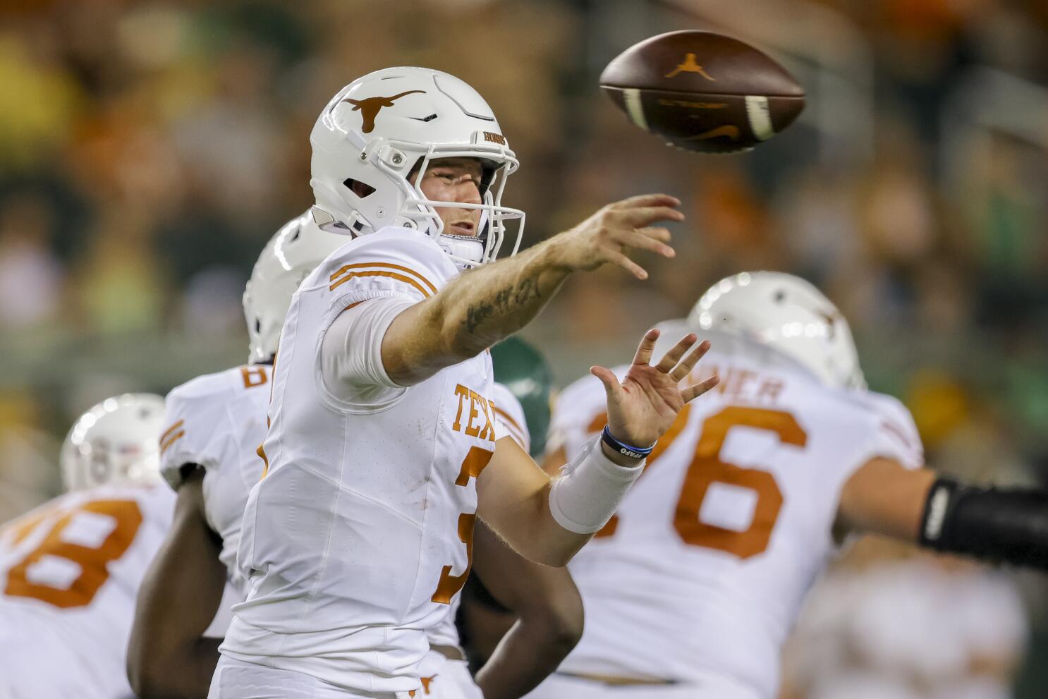 Texas Football returns to run first offense to defeat Kansas 55-14