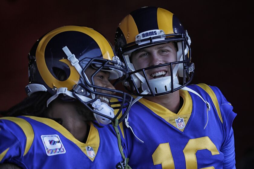 LOS ANGELES, CA, SUNDAY, OCTOBER 8, 2017 - Rams quarterback Jared Goff and running back Todd Gurley share a laugh before a game against the Seattle Seahawks at the Coliseum. (Robert Gauthier/Los Angeles Times)