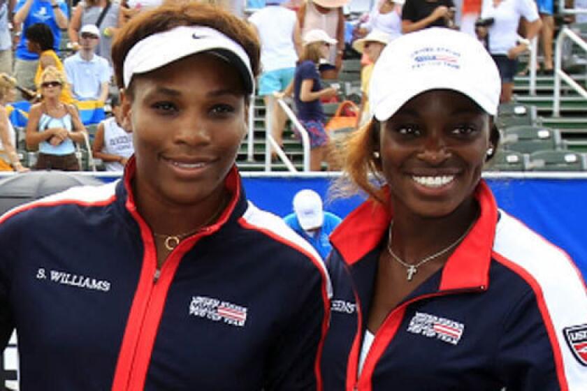 Serena Williams, left, and Sloane Stephens stand side by side in a U.S. Fed Cup team photo in April.