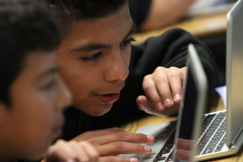 Students in Perris, Calif., work on Chromebooks in 2013.