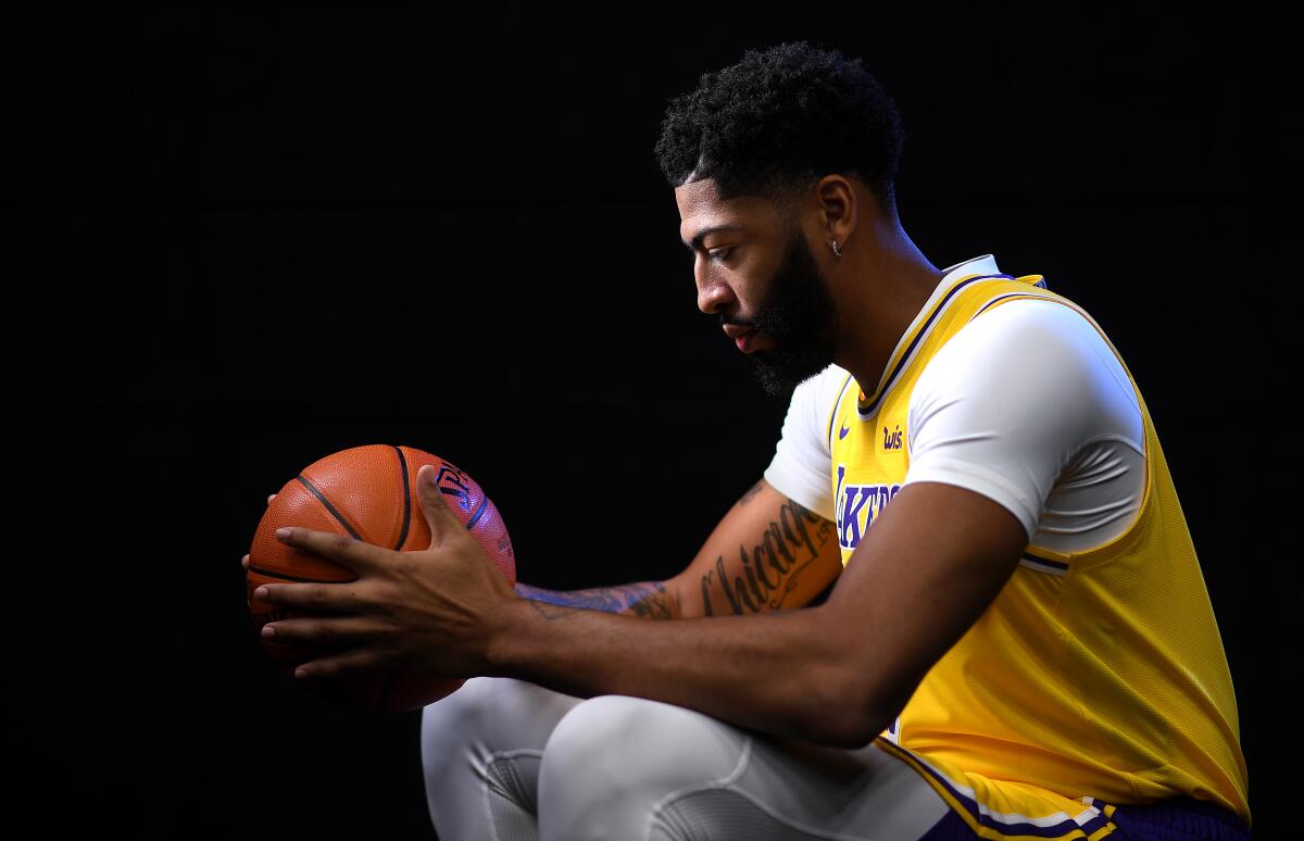 Lakers forward Anthony Davis, posing for a photo during media day in El Segundo before the season, spent seven seasons playing for the New Orlean Pelicans.