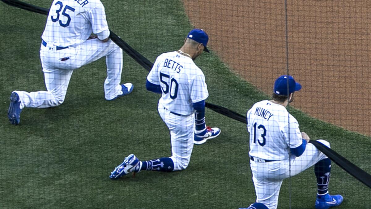 Yankees and Nationals Kneel in Moment of Silence Before MLB Opener