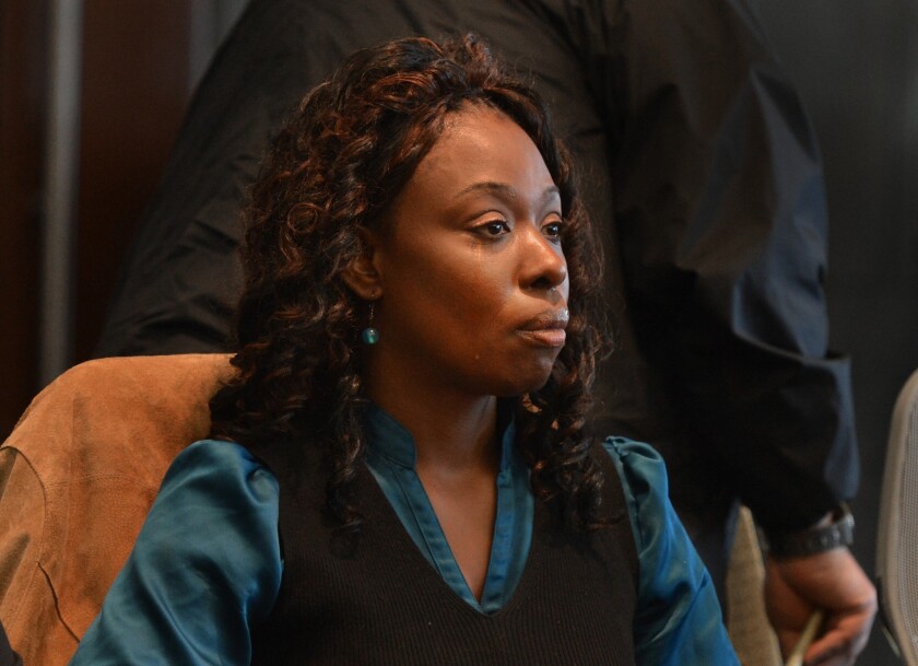 Crystal Mangum sits in court Friday during the reading of the jury's verdict finding her guilty of second-degree murder in the stabbing death of her boyfriend in 2011.