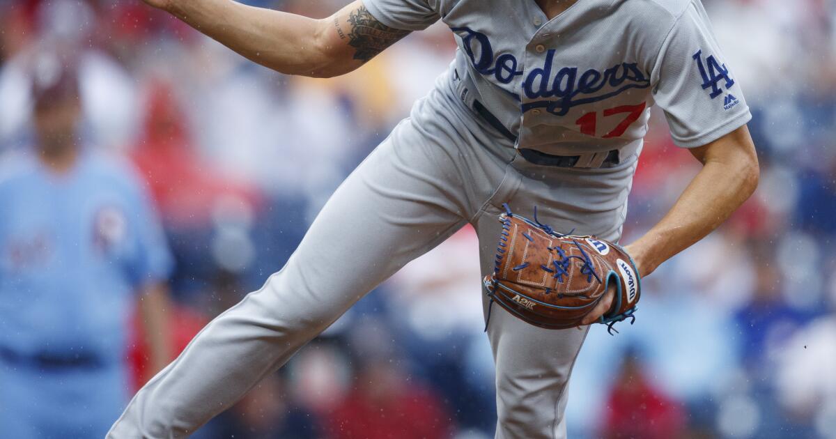 Dodgers strike against Phillies bullpen after rain delay halts