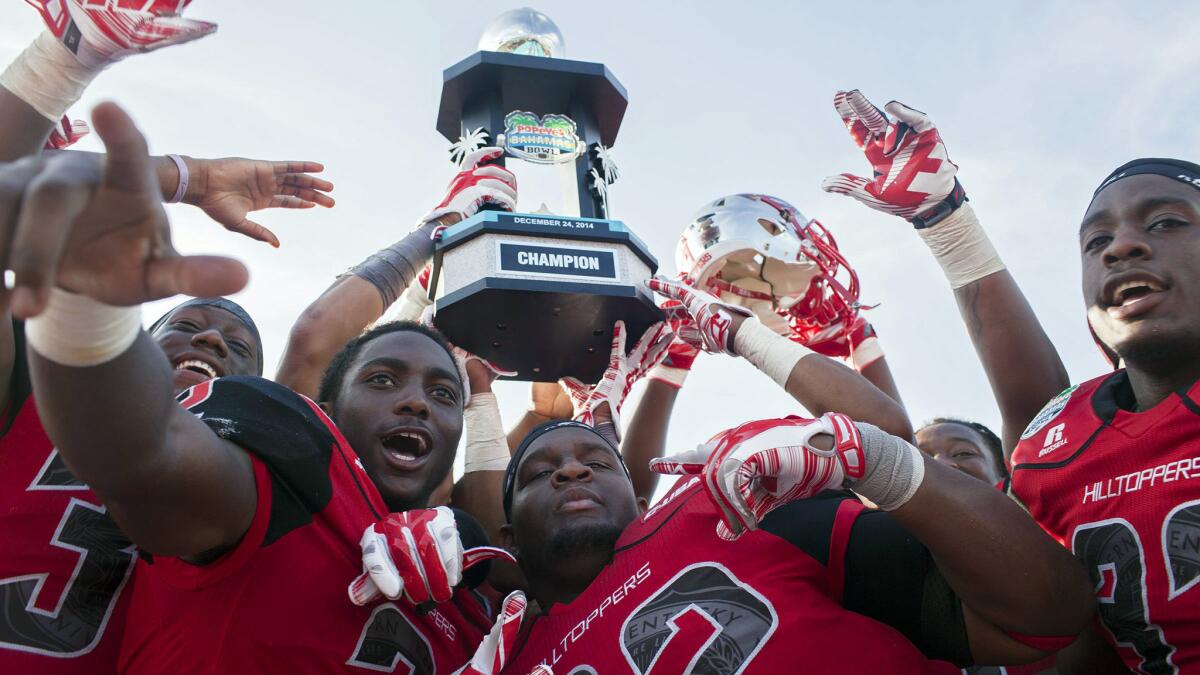 Western Kentucky football players celebrate their 49-48 victory over Central Michigan in the Bahamas Bowl on Wednesday.