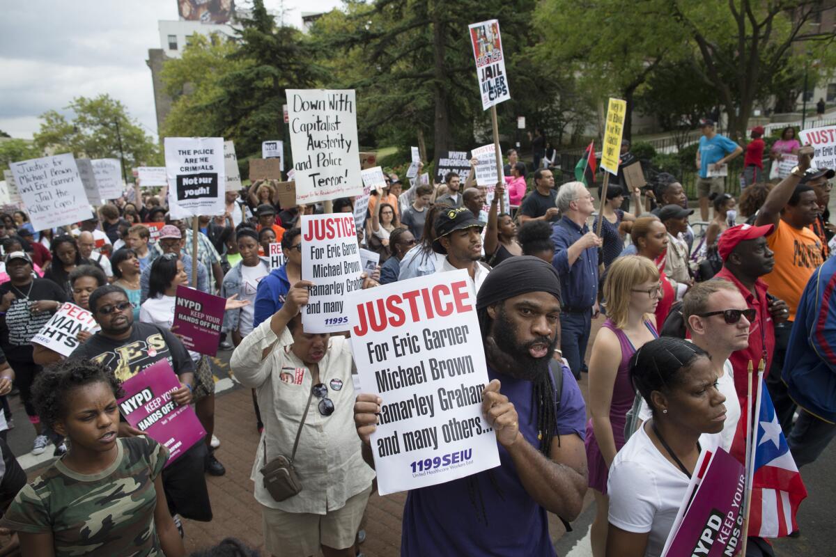 Demonstrators in August 2014 protest the death of Eric Garner in Staten Island.