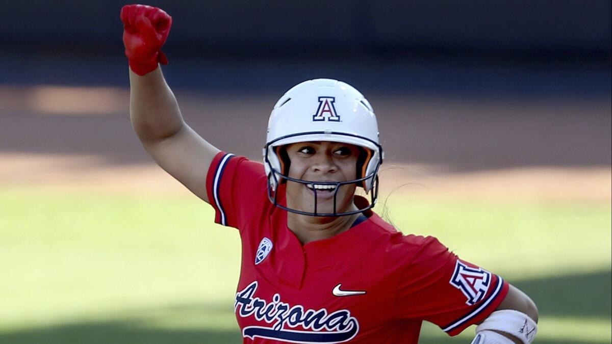 Arizona's Dejah Mulipola celebrates after hitting a solo home run against Mississippi in Game 2 of the NCAA super regional on May 25.
