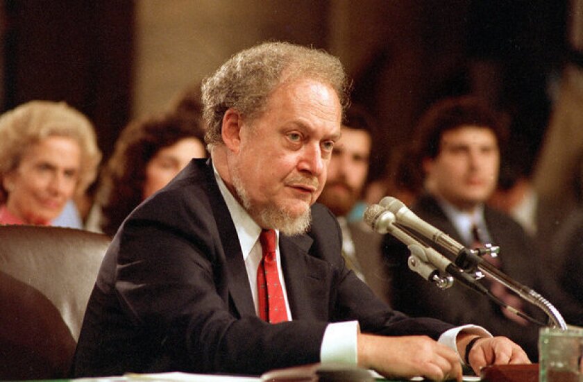 Robert Bork, shown at 1987 hearings on his nomination to the Supreme Court, died Wednesday.