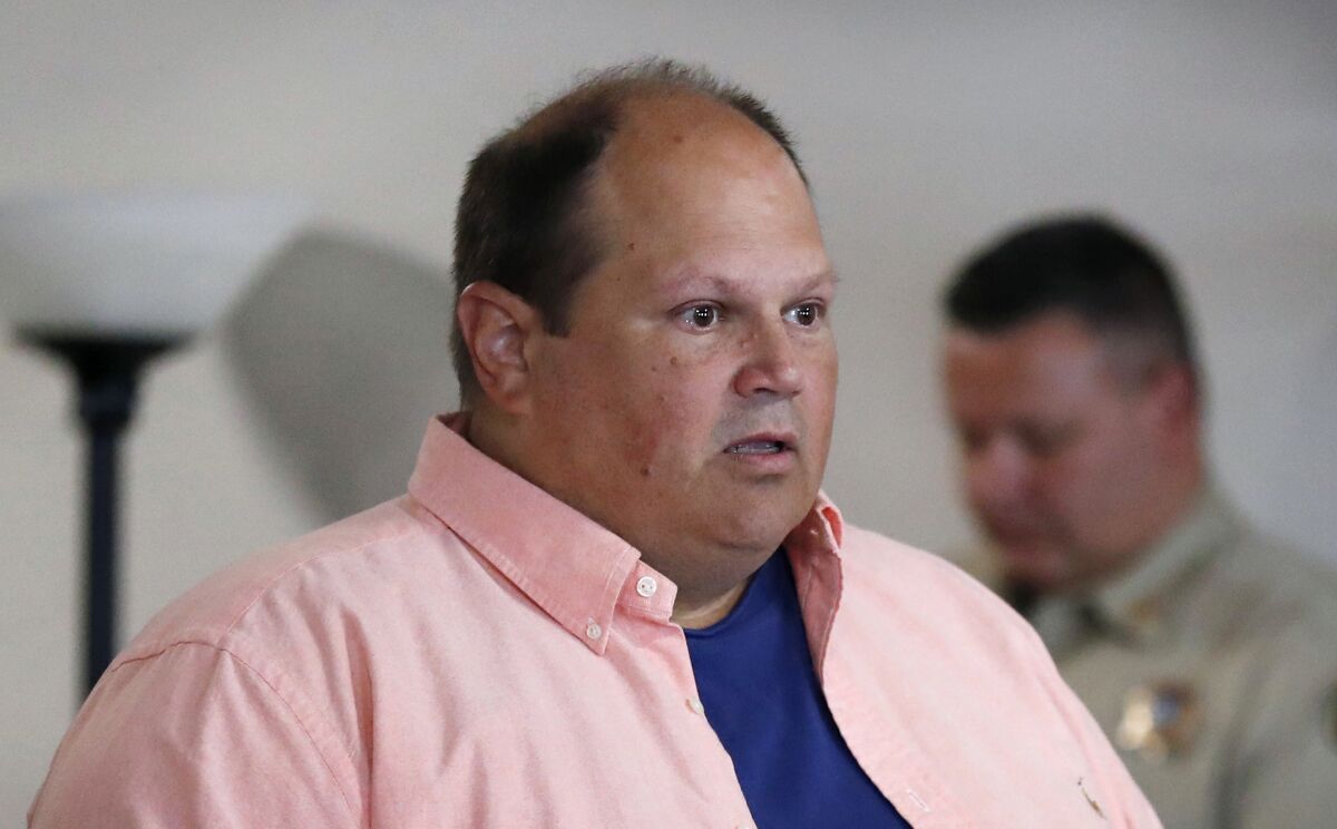 FILE - Former lottery computer programmer Eddie Tipton speaks during his sentencing hearing, Tuesday, Aug. 22, 2017, at the Polk County Courthouse in Des Moines, Iowa. Tipton, serving a 25-year prison sentence for rigging computers to win lottery jackpots for himself, friends and family will be released from an Iowa prison on parole after serving nearly five years, but he could be forced to return to prison in another state if he doesn't pay required restitution. The Iowa Board of Parole granted release to Tipton on Jan. 20, 2022, because of good behavior, and he will be allowed to live in Texas, a board document said. (AP Photo/Charlie Neibergall File)