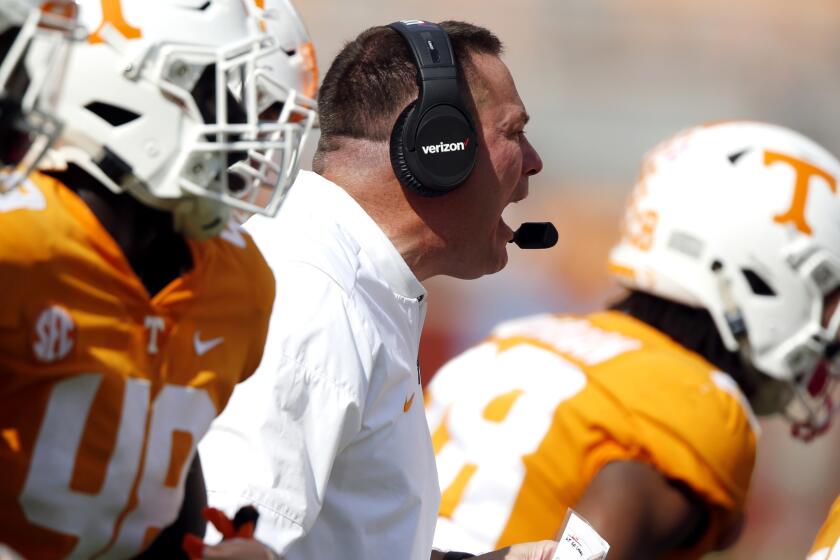 Tennessee head coach Butch Jones yells to his players in the second half of an NCAA college football game against South Carolina, Saturday, Oct. 14, 2017, in Knoxville, Tenn. South Carolina won 15-9. (AP Photo/Wade Payne)