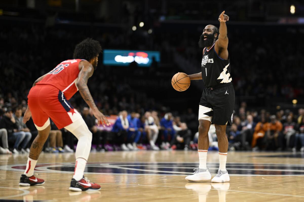 Clippers guard James Harden dribbles against Washington forward Marvin Bagley III in the first half.