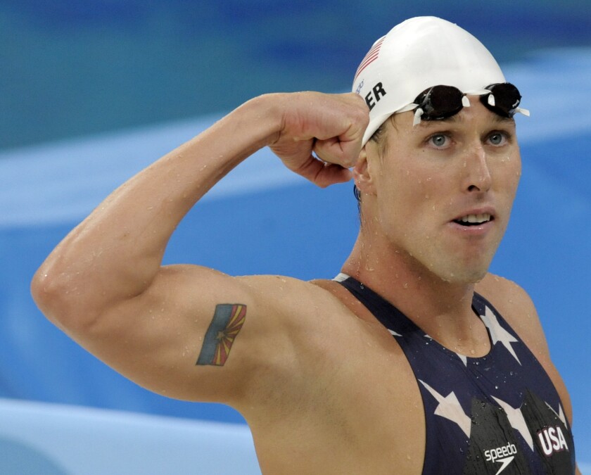 Klete Keller flexes poolside at the 2008 Beijing Olympics.