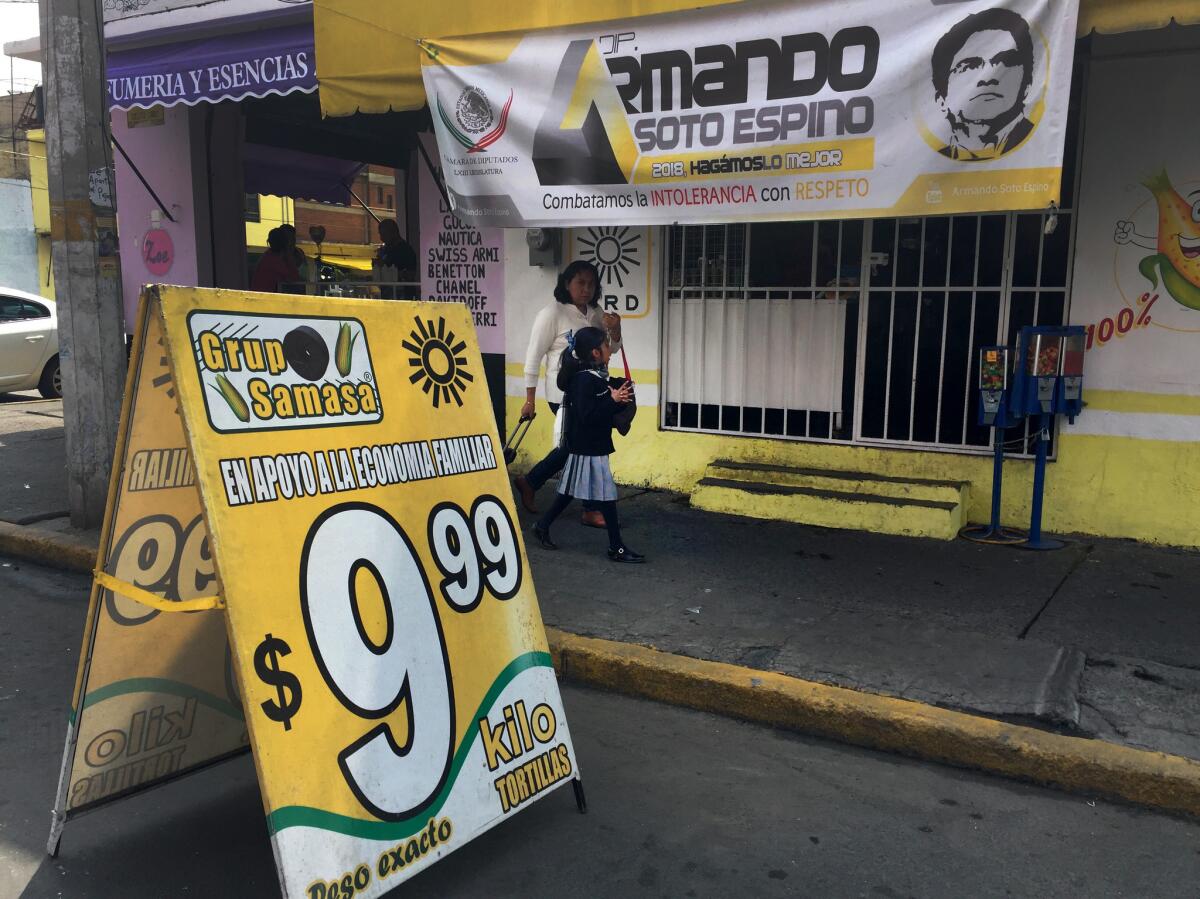 Tortillerias such as this one in Nezahualcoyotl, Mexico, receive assistance from a foundation associated with a local political candidate, Armando Soto, that enables them to lower their prices.