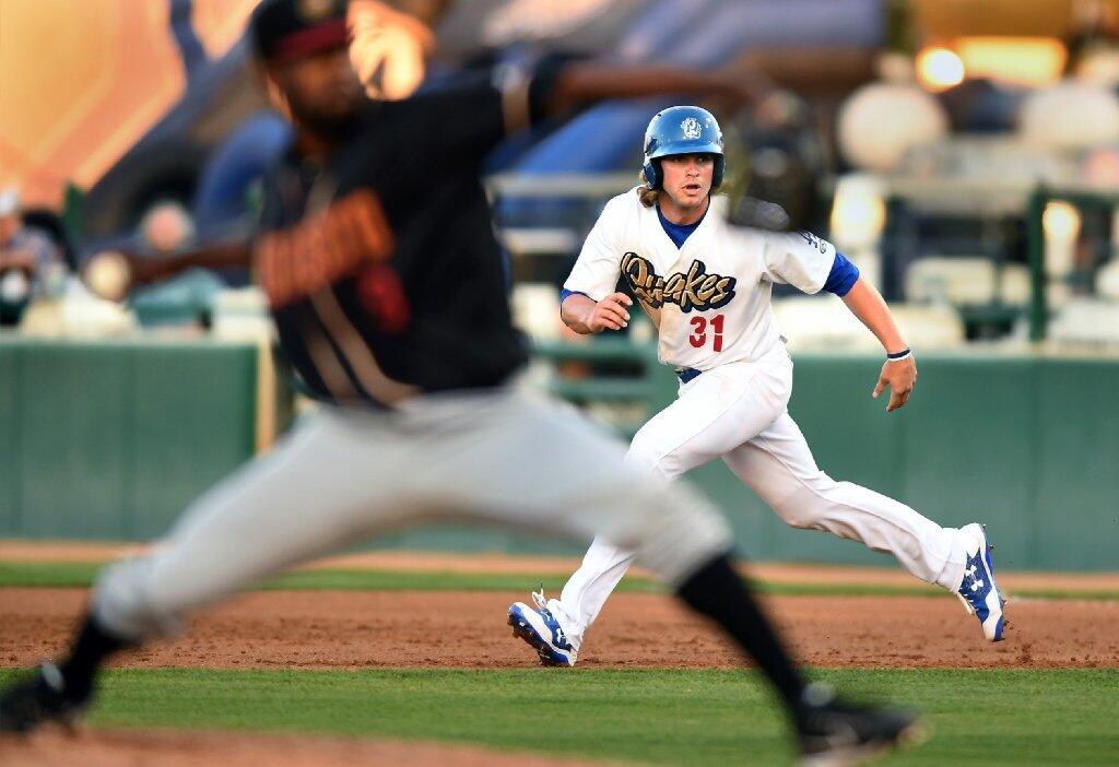 Dodgers outfield prospect DJ Peters runs the bases for the Rancho Cucamonga Quakes in a recent game.