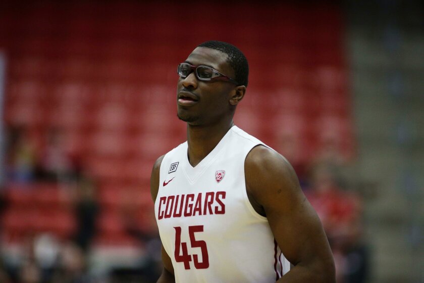Washington State's Valentine Izundu (45) walks on the court during the first half of an NCAA college basketball game against Arizona State, Saturday, Feb. 6, 2016, in Pullman, Wash. (AP Photo/Young Kwak)