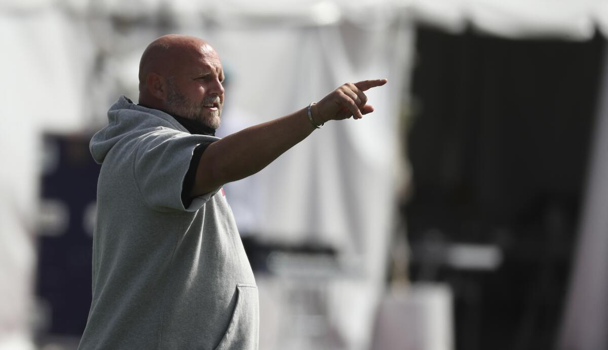 Buffalo Bills offensive coordinator Brian Daboll directs players during training camp in August.