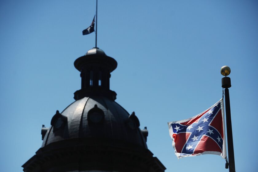 The Confederate flag flies near the South Carolina Statehouse in Columbia in June 2015.
