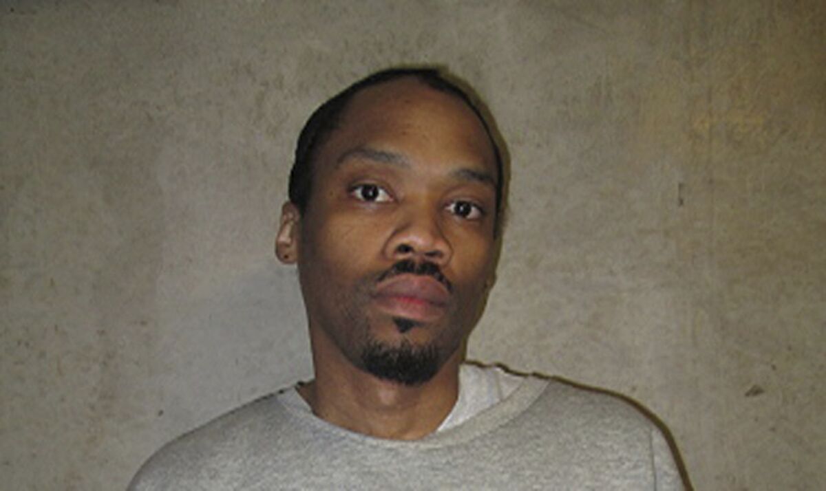 FILE - This undated file photo released by Oklahoma Department of Corrections shows Julius Jones. Oklahoma County's top prosecutor is asking the state's Pardon and Parole Board to reject a commutation request from Jones. Jones' case has drawn national attention and he's scheduled for a commutation hearing next week. Jones was convicted and sentenced to die for the 1999 shooting death of Edmond businessman Paul Howell. (Oklahoma Department of Corrections via AP File)