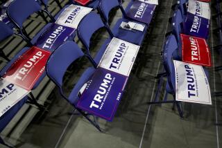 MILWAUKEE, WI JULY 15, 2024 -- Trump signs are placed on the seats at the Republican National Convention at Milwaukee, WI on Monday, July 15, 2024. (Jason Armond / Los Angeles Times)