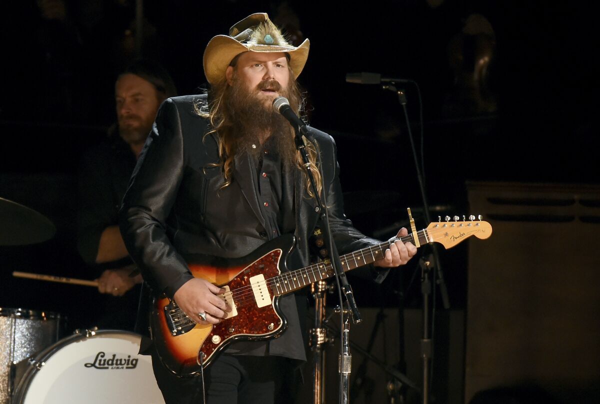 Country music recording artist Chris Stapleton performs during the CMA Awards.