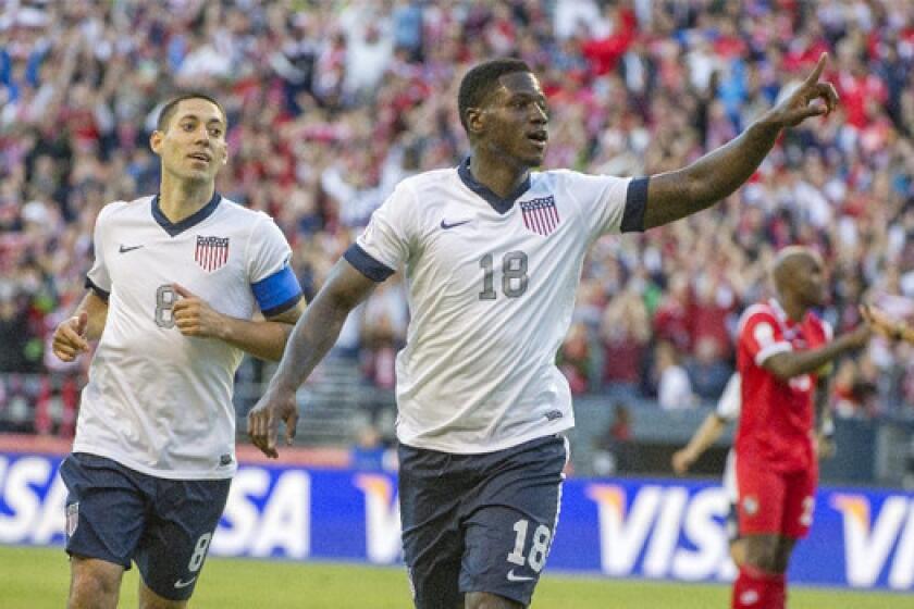 Eddie Johnson celebrates his goal with Clint Dempsey, left, during Team USA's 2-0 victory over Panama in a World Cup qualifying match in Seattle on Tuesday.