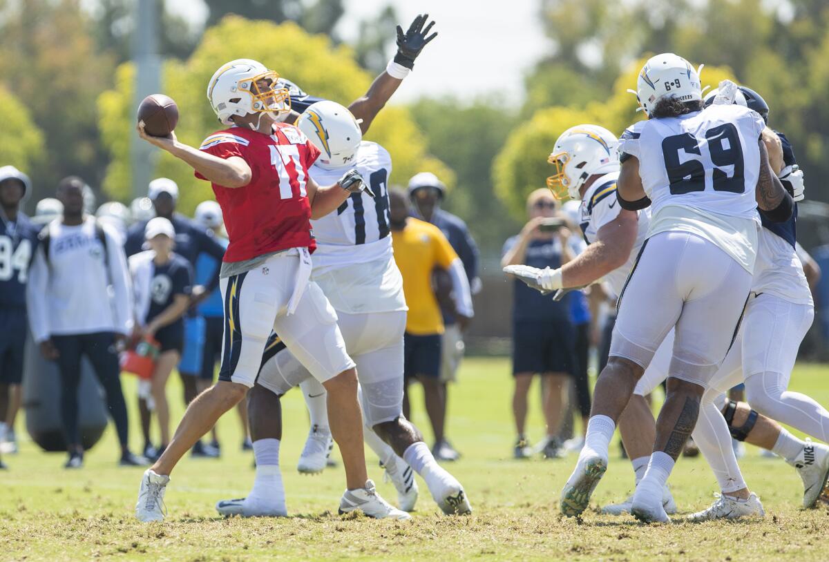 The Chargers' Philip Rivers passes during a joint practice with the Rams on Thursday.