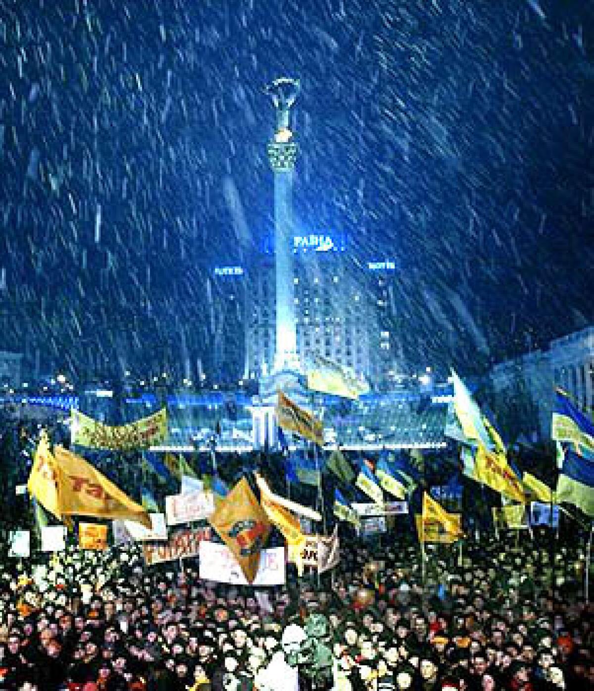 Supporters of Ukrainian opposition presidential candidate Viktor Yushchenko rally in Kiev, the capital. Yushchenko officially lost  through fraud, observers say.