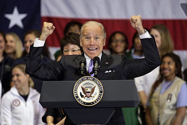 Vice President Joe Biden strikes an inspirational pose during a speech to female student athletes, telling them how encouraging they are to younger girls.