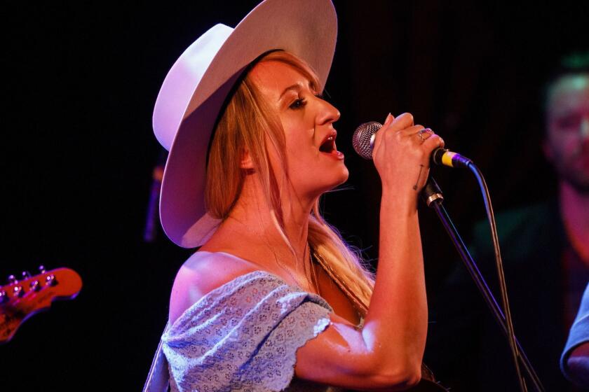 Margo Price performs during a tribute to John Prine at The Troubadour on Saturday, February 9, 2019 in West Hollywood, Calif. Prine was honored during the annual pre-Grammy Awards gathering of the Americana Music Association. (Patrick T. Fallon/ For The Los Angeles Times)