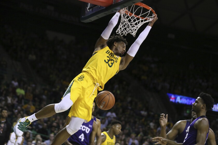 Baylor forward Freddie Gillespie dunks over TCU in the second half of an NCAA college basketball game, Saturday, Feb. 1, 2020, in Waco, Texas. Baylor won 68-52. (AP Photo/Rod Aydelotte)