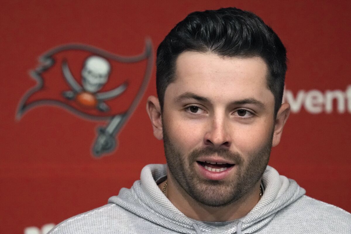 New Tampa Bay Buccaneers quarterback Baker Mayfield answers a question during an NFL football news conference on Monday, March 20, 2023, in Tampa, Fla. The Buccaneers signed Mayfield to a one year contract. (AP Photo/Chris O'Meara)