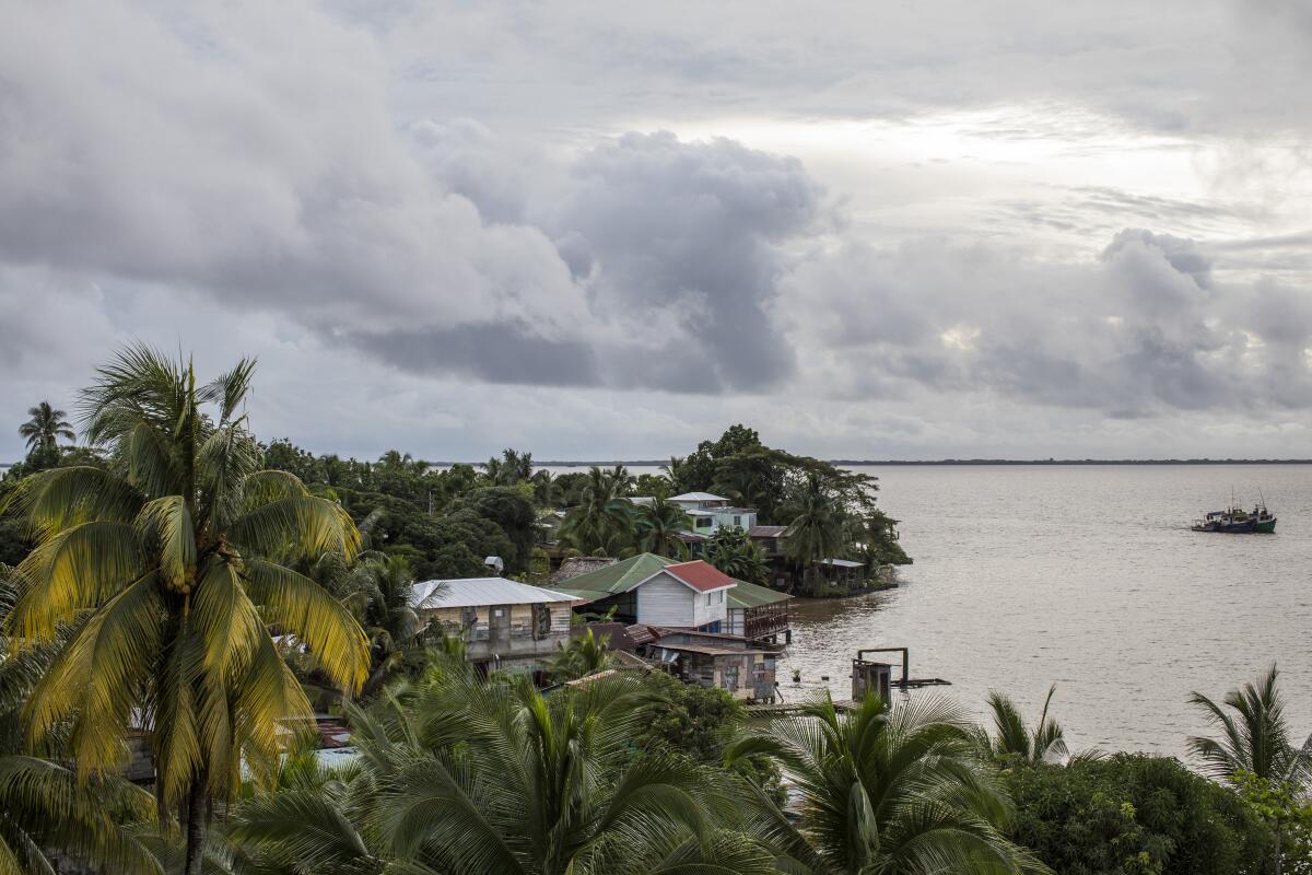 A boat arrives in Bluefields Bay after Tropical Storm Bonnie hit the Caribbean coast of Nicaragua, Saturday, July 2, 2022. (AP Photo/Inti Ocon)