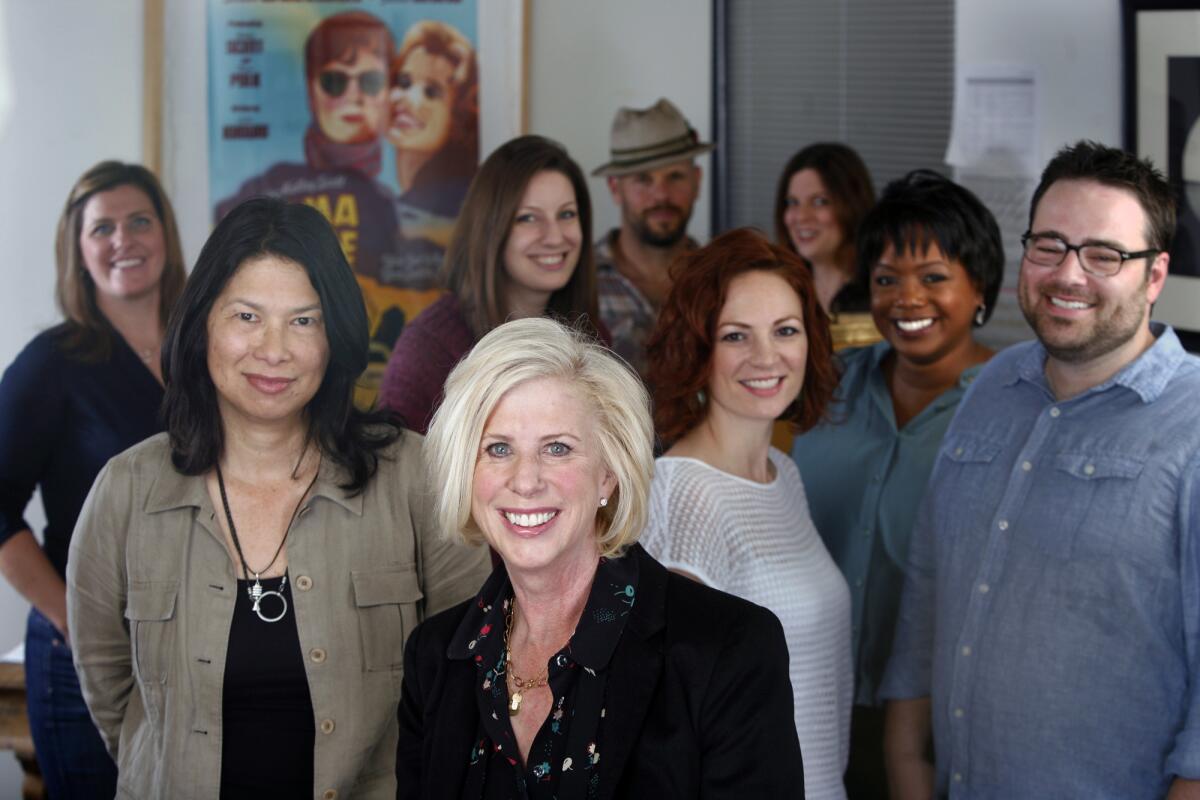 "Nashville" creator Callie Khouri, bottom center, along with show runner Dee Johnson, left, and some of the staff writers in Khouri's Santa Monica office.