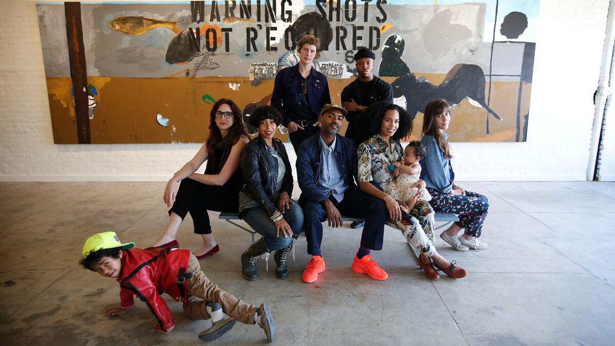 The team behind the Underground Museum includes the late Noah Davis's brother Kahlil Joseph (seated at center), Davis's widow Karon (seated left of Joseph) and new director Megan Steinman (seated, far left).