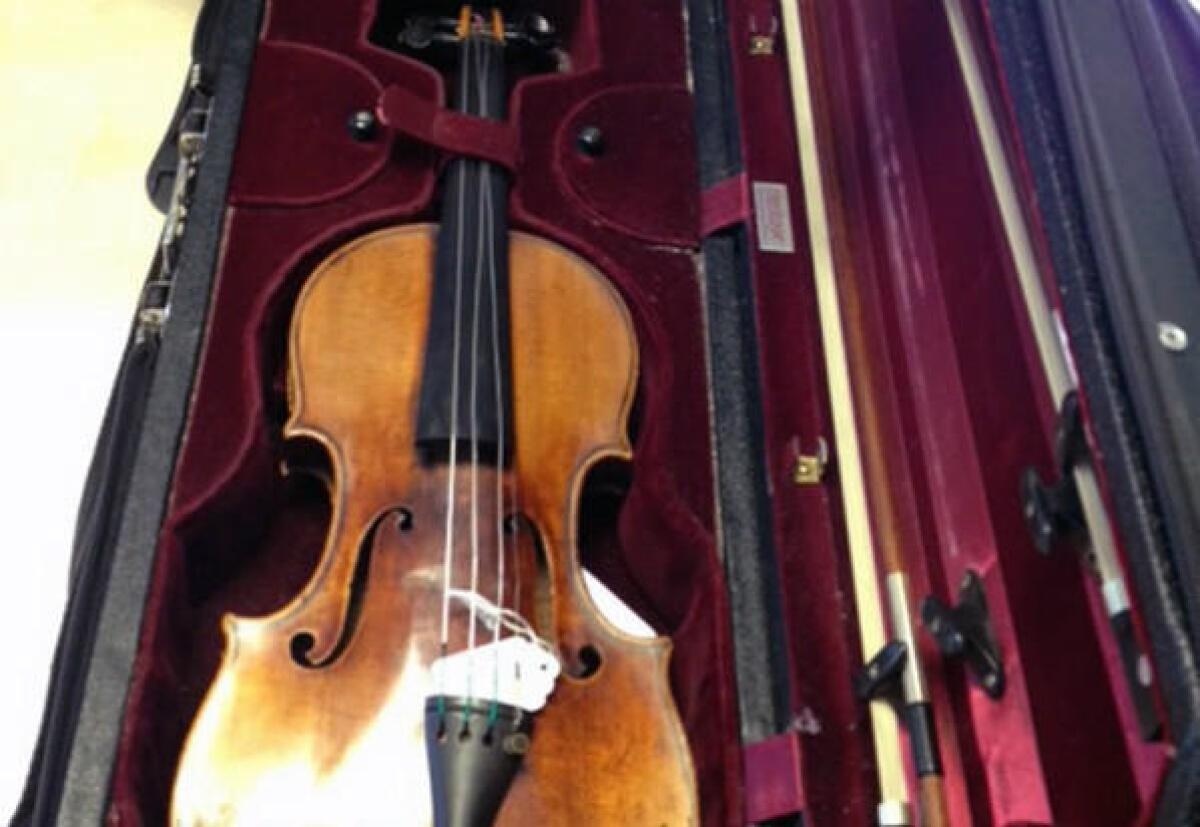 The 1696 Stradivarius violin that was stolen in 2010 from a train station in London has sold at auction for $2.3 million.