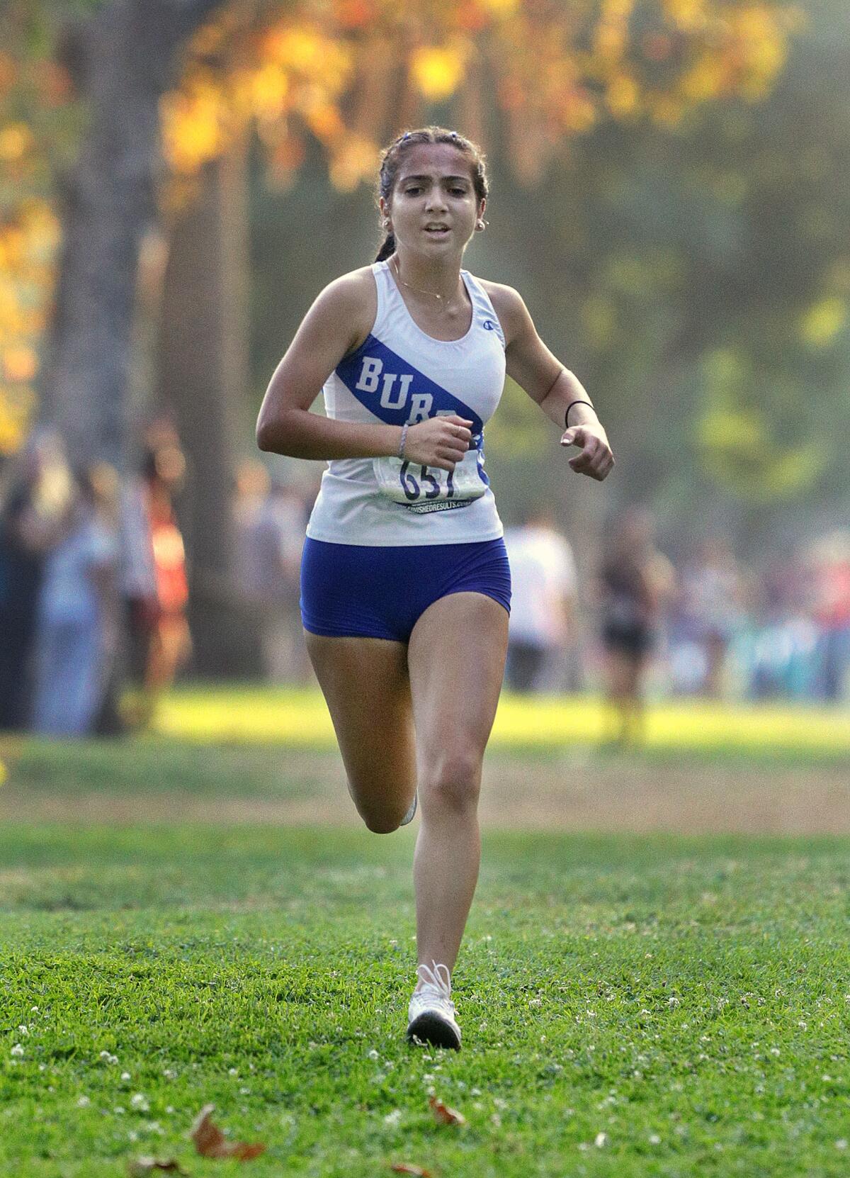 Burbank's Elin Markarian comes to the finish in fifth place in a Pacific League cross country meet at Arcadia Park in Arcadia on Thursday, November 7, 2019. This is the final league meet of the season.