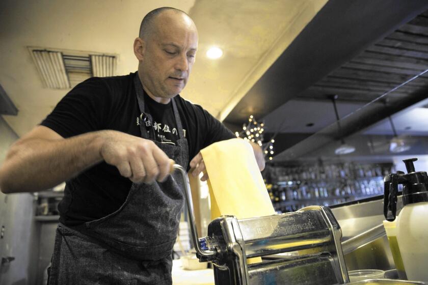 Sotto chef and owner Steve Samson makes fresh pasta for his tortellini in brodo, a Bolognese New Year's staple.