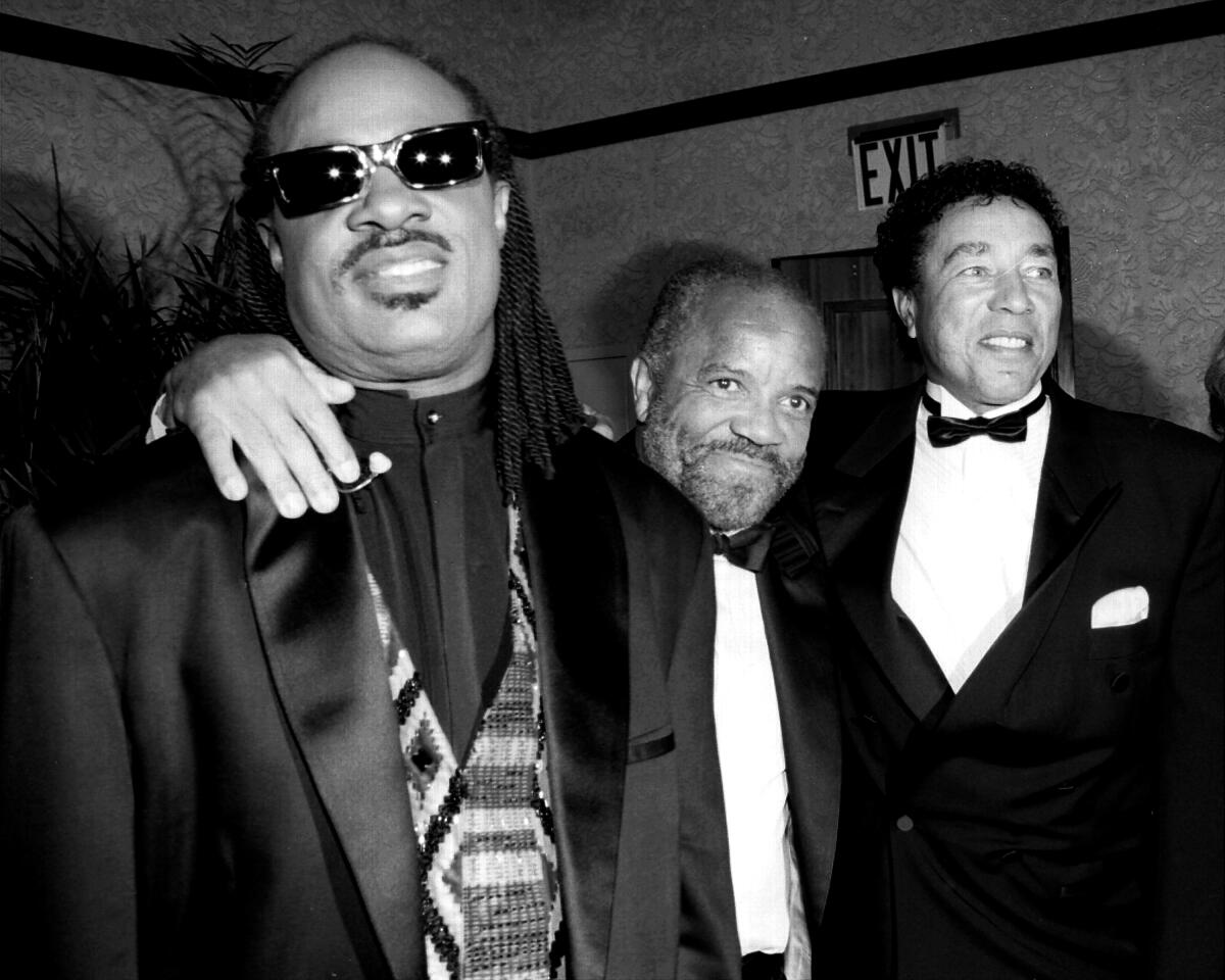 Stevie Wonder, Berry Gordy and Smokey Robinson.
