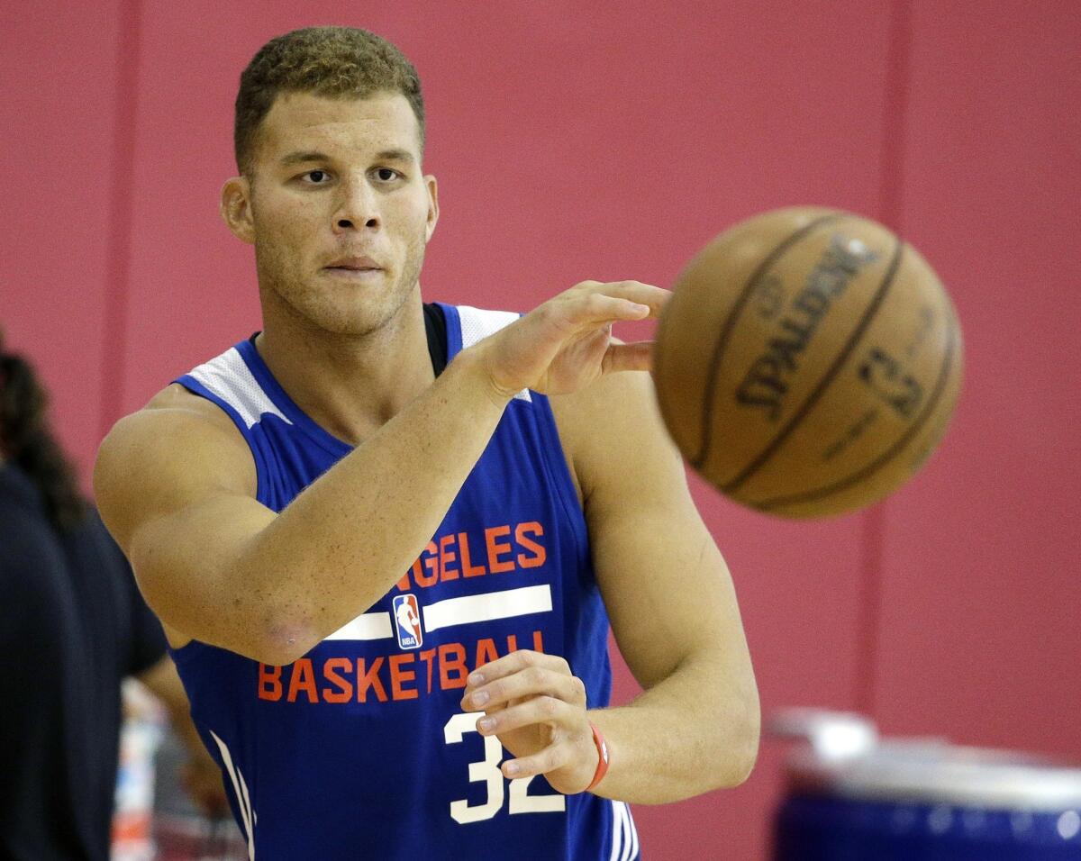Blake Griffin passes a ball during practice at the Clippers' training camp Tuesday in Las Vegas.